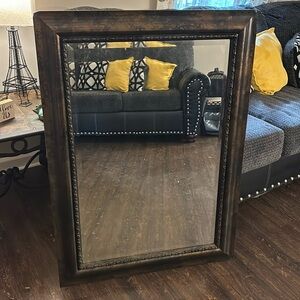 Im selling a mirror its 3 feet and 7 inches its also brown